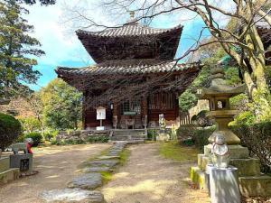 白峯寺 薬師堂・(干支の?)石像・福禄寿